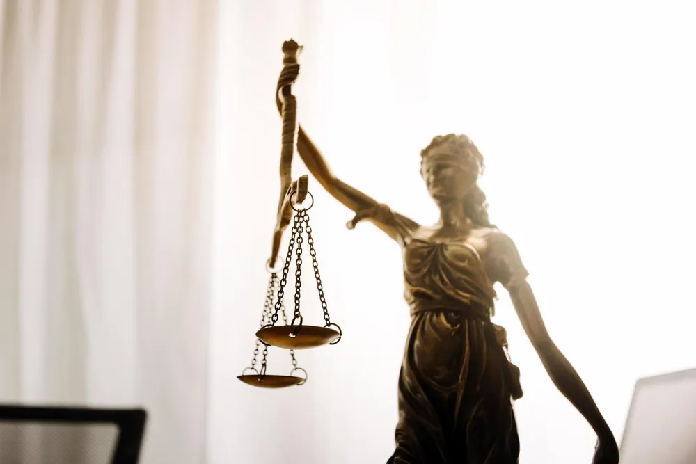 Statue of Lady Justice holding scales